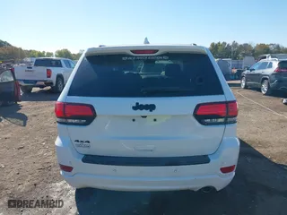 2018 Jeep Grand Cherokee Laredo E with VIN 1C4RJFAGXJC435658, listed as a IAAI auction lot 40659459 with 97,827 mi miles. Bid and sale history available at carsss.com. Image 16.