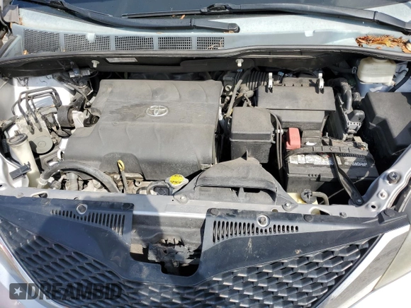 2013 Toyota Sienna SE с VIN 5TDXK3DC2DS383702, выставлен на аукционе Copart как лот 57618165 с пробегом 209 773 миль миль и Списание • Salvage title. История ставок и продаж доступна на DreamBid. Изображение 12.