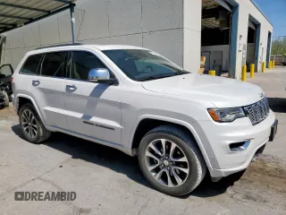 2017 Jeep Grand Cherokee Overland z VIN 1C4RJFCT5HC612721, wystawiony jako Copart lot #57652865 z przebiegiem 103 690 mil mil oraz Tytuł czysty. Historia ofert i sprzedaży dostępna na DreamBid. Obrazek 4.