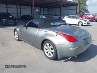 2004 Nissan 350Z Touring with VIN JN1AZ36A44T015510, listed as a IAAI auction lot 41959294 with 180,293 mi miles. Bid and sale history available at carsss.com. Image 3.