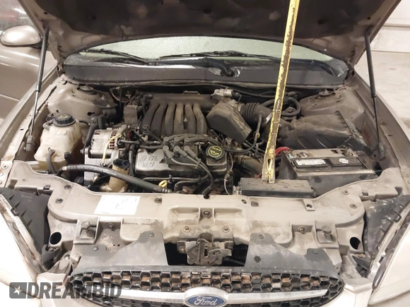 2003 Ford Taurus SES Standard with VIN 1FAFP552X3G184894, listed as a IAAI auction lot 41846677 with 160,824 mi miles. Bid and sale history available at carsss.com. Image 10.
