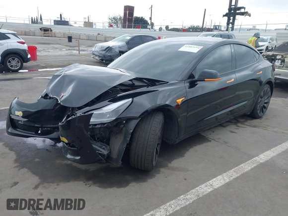 2022 Tesla Model 3 Performance with VIN 5YJ3E1EC3NF248534, listed as a IAAI auction lot 41882694 with 55,415 mi miles and . Bid and sale history available at carsss.com. Image 2.