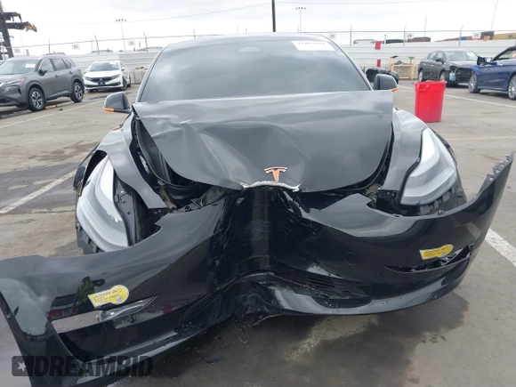 2022 Tesla Model 3 Performance with VIN 5YJ3E1EC3NF248534, listed as a IAAI auction lot 41882694 with 55,415 mi miles and . Bid and sale history available at carsss.com. Image 6.