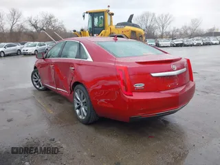 2013 Cadillac XTS z VIN 2G61N5S36D9129188, wystawiony jako IAAI lot #41824147 z przebiegiem 80 985 mil mil oraz . Historia ofert i sprzedaży dostępna na DreamBid. Obrazek 3.