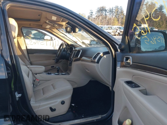 2014 Jeep Grand Cherokee Limited with VIN 1C4RJFBG5EC103342, listed as a IAAI auction lot 41195465 with 126,543 mi miles and . Bid and sale history available at DreamBid. Image 5.