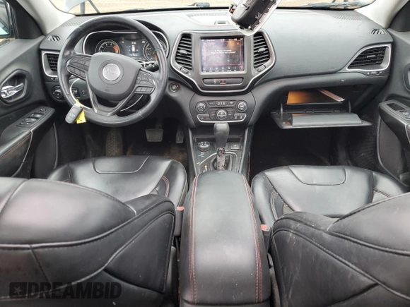 2019 Jeep Cherokee Trailhawk with VIN 1C4PJMBX7KD341534, listed as a Copart auction lot 52352765 with 207,532 mi miles and Salvage Title. Bid and sale history available at DreamBid. Image 8.