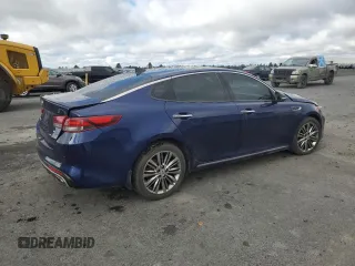 2018 Kia Optima SX with VIN 5XXGV4L25JG230508, listed as a Copart auction lot 56423135 with 100,575 mi miles and Salvage title. Bid and sale history available at DreamBid. Image 3.