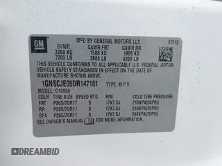 2013 Chevrolet Suburban LT with VIN 1GNSCJE05DR147101, listed as a IAAI auction lot 42336950 with 147,429 mi miles and . Bid and sale history available at DreamBid. Image 9.