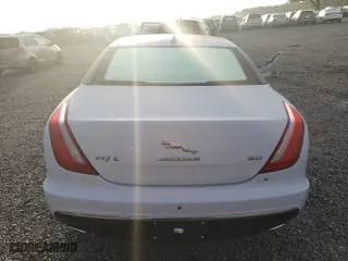2018 Jaguar XJ with VIN SAJWA2G76J8W13668, listed as a Copart auction lot 59424963 with 27,983 mi miles. Bid and sale history available at carsss.com. Image 6.