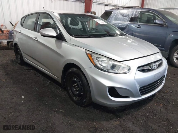 2013 Hyundai Accent GL with VIN KMHCT5AE7DU083867, listed as a IAAI auction lot 41390970 with 160,630 mi miles. Bid and sale history available at carsss.com. Image 1.