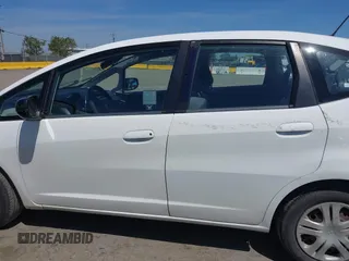 2009 Honda Fit z VIN JHMGE88239S045275, wystawiony jako IAAI lot #42142589 z przebiegiem 145 964 mil mil oraz . Historia ofert i sprzedaży dostępna na DreamBid. Obrazek 14.