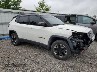 2017 Jeep Compass Trailhawk with VIN 3C4NJDDB2HT646693, listed as a Copart auction lot 58200235 with 62,765 mi miles and Salvage title. Bid and sale history available at DreamBid. Image 4.