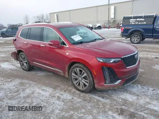 2021 Cadillac XT6 Premium Luxury with VIN 1GYKPDRS7MZ224376, listed as a IAAI auction lot 41246449 with 73,074 mi miles. Bid and sale history available at carsss.com. Image 1.