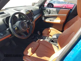 2022 MINI Countryman Cooper S z VIN WMZ53BR07N3N34260, wystawiony jako IAAI lot #42137868 z przebiegiem Nie podano mil oraz . Historia ofert i sprzedaży dostępna na DreamBid. Obrazek 5.