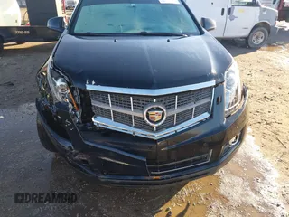 2010 Cadillac SRX Premium Collection with VIN 3GYFNCEY9AS521993, listed as a IAAI auction lot 41154875 with 219,713 mi miles. Bid and sale history available at carsss.com. Image 6.