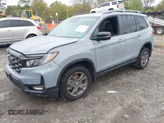 2024 Honda Passport TrailSport with VIN 5FNYF8H6XRB017735, listed as a IAAI auction lot 41931822 with 20,815 mi miles and . Bid and sale history available at DreamBid. Image 2.