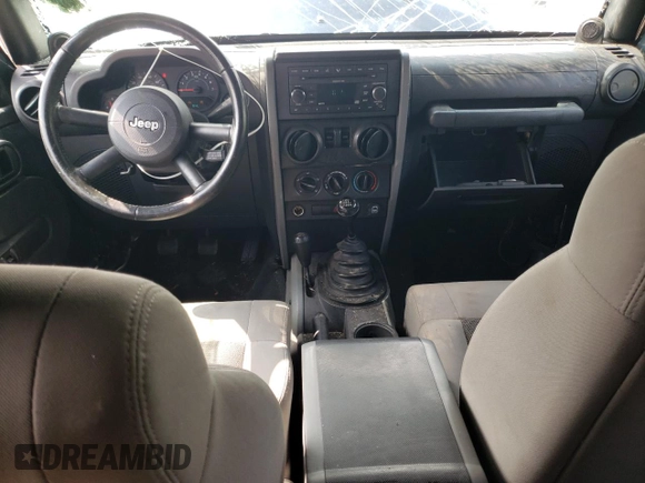 2008 Jeep Wrangler X with VIN 1J4FA24158L563572, listed as a Copart auction lot 58667265 with 162,649 mi miles and Salvage title. Bid and sale history available at DreamBid. Image 8.