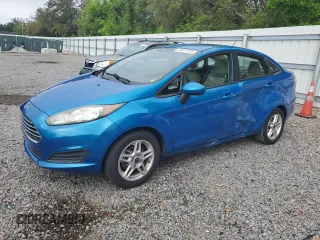 2017 Ford Fiesta SE with VIN 3FADP4BJ1HM114808, listed as a Copart auction lot 50977705 with 76,684 mi miles and Salvage Title. Bid and sale history available at carsss.com. Image 1.