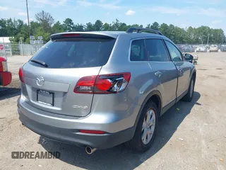 2015 Mazda CX-9 Sport z VIN JM3TB2BA3F0451593, wystawiony jako IAAI lot #42870124 z przebiegiem 196 390 mil mil oraz . Historia ofert i sprzedaży dostępna na DreamBid. Obrazek 4.