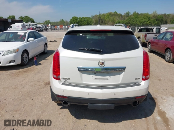 2012 Cadillac SRX Performance Collection z VIN 3GYFNBE39CS628740, wystawiony jako IAAI lot #42063414 z przebiegiem 88 260 mil mil oraz . Historia ofert i sprzedaży dostępna na DreamBid. Obrazek 16.