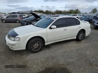 1999 Nissan Maxima GXE z VIN JN1CA21D2XM415396, wystawiony jako Copart lot #51003705 z przebiegiem 118 010 mil mil oraz Szkoda całkowita • Salvage title. Historia ofert i sprzedaży dostępna na DreamBid. Obrazek 1.