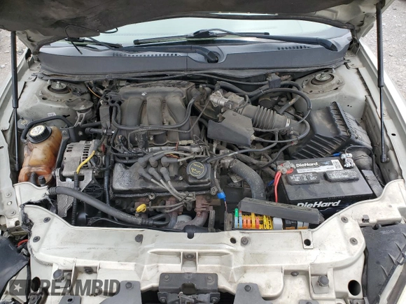 2006 Ford Taurus SE z VIN 1FAFP53U56A151555, wystawiony jako Copart lot #55227665 z przebiegiem 146 109 mil mil oraz Szkoda całkowita • Salvage title. Historia ofert i sprzedaży dostępna na DreamBid. Obrazek 11.