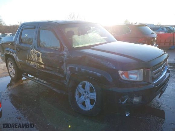 2009 Honda Ridgeline RTL with VIN 5FPYK16569B099998, listed as a IAAI auction lot 41403995 with 189,146 mi miles. Bid and sale history available at carsss.com. Image 1.