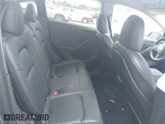 2021 Tesla Model Y Long Range z VIN 5YJYGDEE6MF070068, wystawiony jako IAAI lot #42224634 z przebiegiem 33 850 mil mil oraz . Historia ofert i sprzedaży dostępna na DreamBid. Obrazek 8.