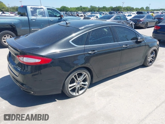2014 Ford Fusion Titanium with VIN 3FA6P0K9XER216551, listed as a IAAI auction lot 42037004 with 113,857 mi miles and . Bid and sale history available at DreamBid. Image 4.