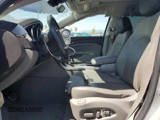 2012 Cadillac SRX Luxury Collection with VIN 3GYFNAE36CS653119, listed as a Copart auction lot 53866715 with 69,997 mi miles and Salvage Title. Bid and sale history available at DreamBid. Image 7.