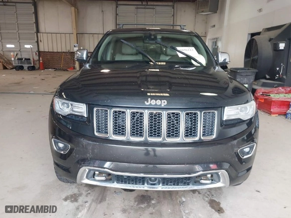 2014 Jeep Grand Cherokee Overland with VIN 1C4RJFCM4EC386398, listed as a IAAI auction lot 41696113 with 119,110 mi miles. Bid and sale history available at carsss.com. Image 12.