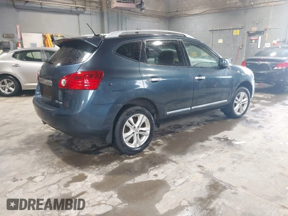 2013 Nissan Rogue S with VIN JN8AS5MVXDW642590, listed as a IAAI auction lot 42213521 with 164,109 mi miles and . Bid and sale history available at DreamBid. Image 4.