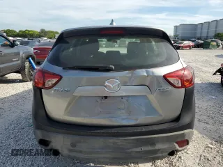 2015 Mazda CX-5 Sport with VIN JM3KE2BE2F0445810, listed as a Copart auction lot 65672555 with 218,675 mi miles and Clean title. Bid and sale history available at DreamBid. Image 6.