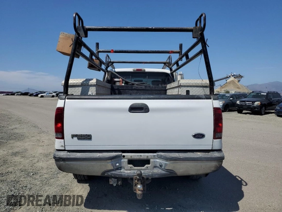 2002 Ford F-250 XL z VIN 1FTNX21F42EC44207, wystawiony jako Copart lot #60615915 z przebiegiem 320 609 mil mil oraz Szkoda całkowita • Salvage title. Historia ofert i sprzedaży dostępna na DreamBid. Obrazek 6.