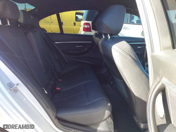 2018 BMW 3 Series 330i with VIN WBA8B9G58JNU97318, listed as a IAAI auction lot 41205434 with 62,582 mi miles. Bid and sale history available at carsss.com. Image 8.