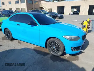 2016 BMW 2 Series 228i with VIN WBA1F9C58GV545467, listed as a IAAI auction lot 41784660 with 163,389 mi miles. Bid and sale history available at carsss.com. Image 1.