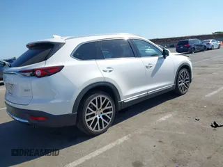 2017 Mazda CX-9 Grand Touring with VIN JM3TCBDY3H0132351, listed as a IAAI auction lot 42346910 with 124,990 mi miles and . Bid and sale history available at DreamBid. Image 4.