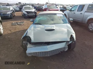 2004 Ford Thunderbird Pacific Coast Roadster with VIN 1FAHP63AX4Y107544, listed as a IAAI auction lot 41441354 with Not Provided miles and . Bid and sale history available at DreamBid. Image 12.