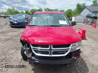 2013 Dodge Journey SE with VIN 3C4PDCAB4DT723573, listed as a IAAI auction lot 42347234 with 109,349 mi miles and . Bid and sale history available at DreamBid. Image 11.