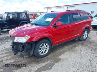 2014 Dodge Journey SXT z VIN 3C4PDCBG2ET161135, wystawiony jako IAAI lot #42233836 z przebiegiem 119 230 mil mil oraz . Historia ofert i sprzedaży dostępna na DreamBid. Obrazek 2.