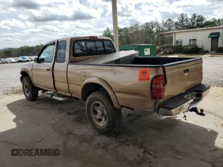 1999 Toyota Tacoma with VIN 4TAWN72NXXZ563507, listed as a Copart auction lot 49888575 with 387,818 mi miles and Salvage title. Bid and sale history available at DreamBid. Image 2.