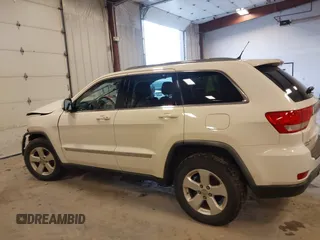 2011 Jeep Grand Cherokee 70th Anniversary with VIN 1J4RR4GG4BC702759, listed as a IAAI auction lot 41871604 with 143,583 mi miles. Bid and sale history available at carsss.com. Image 14.