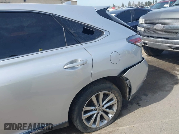 2015 Lexus RX 450h with VIN 2T2ZB1BA7FC002089, listed as a IAAI auction lot 41826675 with 100,852 mi miles and . Bid and sale history available at DreamBid. Image 18.