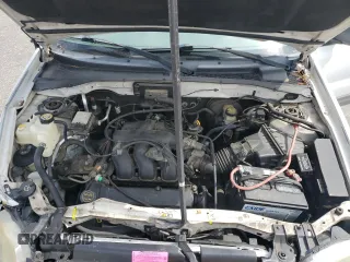 2002 Ford Escape XLT Choice with VIN 1FMYU04172KA40489, listed as a Copart auction lot 58437165 with 212,793 mi miles and Salvage title. Bid and sale history available at DreamBid. Image 12.