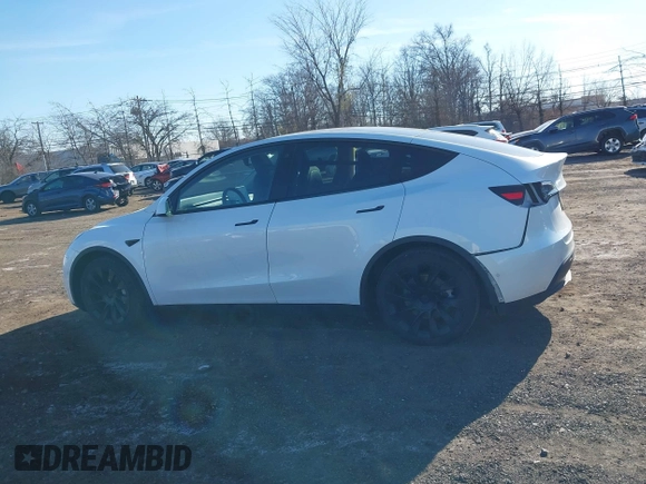 2022 Tesla Model Y Long Range with VIN 7SAYGAEE3NF337220, listed as a IAAI auction lot 41703912 with 46,319 mi miles and . Bid and sale history available at carsss.com. Image 14.