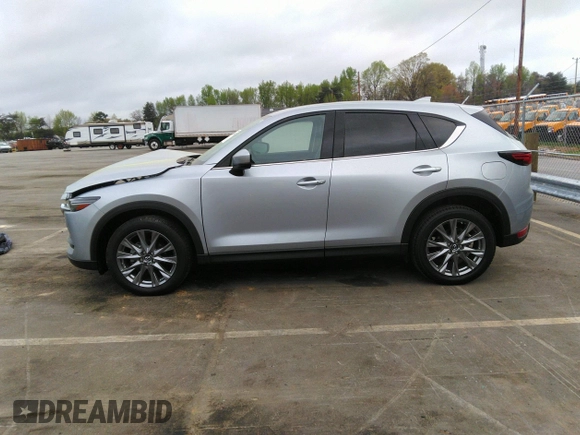 2019 Mazda CX-5 Grand Touring with VIN JM3KFADM2K1631928, listed as a IAAI auction lot 41961695 with 41,190 mi miles. Bid and sale history available at carsss.com. Image 15.