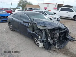 2018 Honda Civic EX with VIN 19XFC2F75JE035935, listed as a IAAI auction lot 41795110 with 92,687 mi miles and . Bid and sale history available at DreamBid. Image 1.