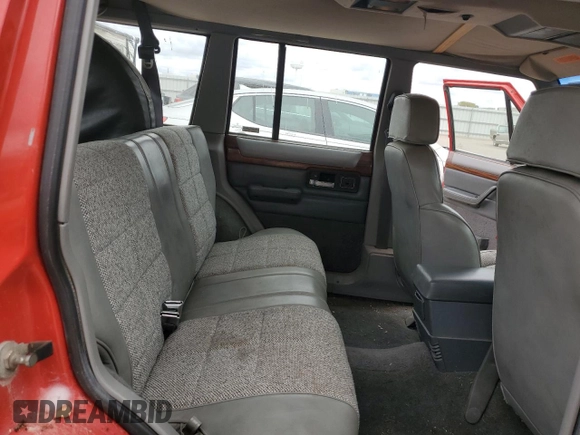 1994 Jeep Cherokee Country with VIN 1J4FJ78S0RL183914, listed as a Copart auction lot 75946094 with 67,999 mi miles and Clean Title. Bid and sale history available at carsss.com. Image 11.