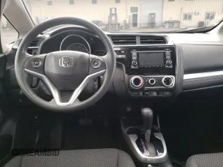 2020 Honda Fit LX z VIN 3HGGK5H40LM702884, wystawiony jako Copart lot #66718212 z przebiegiem 8 120 mil mil oraz . Historia ofert i sprzedaży dostępna na DreamBid. Obrazek 8.