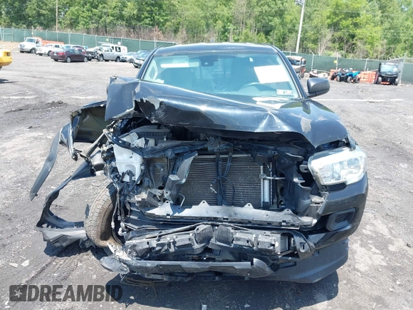 2019 Toyota Tacoma SR with VIN 5TFSX5EN7KX070319, listed as a IAAI auction lot 42475609 with 62,029 mi miles and . Bid and sale history available at DreamBid. Image 6.